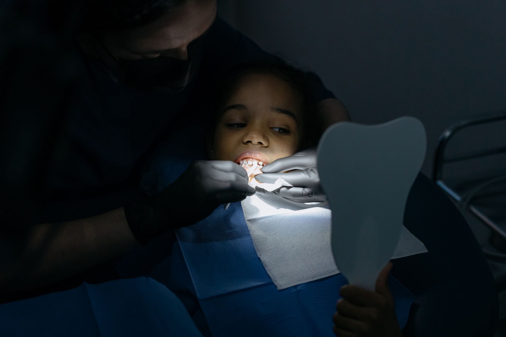 A girl having a dental checkup in Gainesville